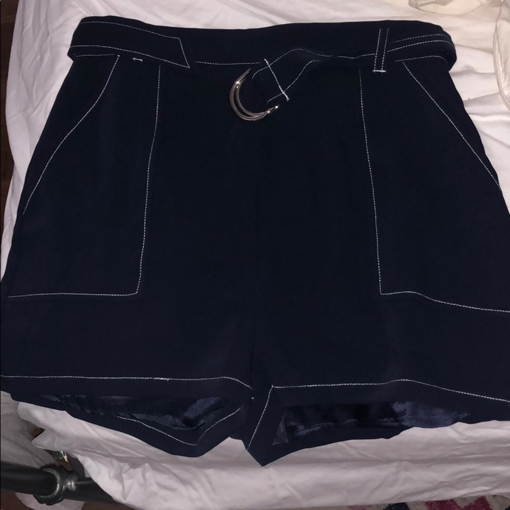 Dark blue high waisted shorts w/ white stitching